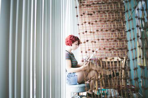 chesterton woman sitting on gray floor united states